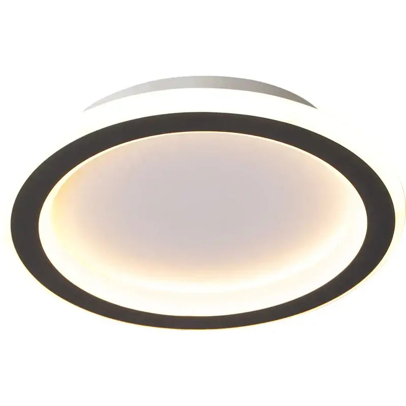Modern oval-shaped decorbites black led ceiling light with sleek black ring and glowing white panel for indoor use