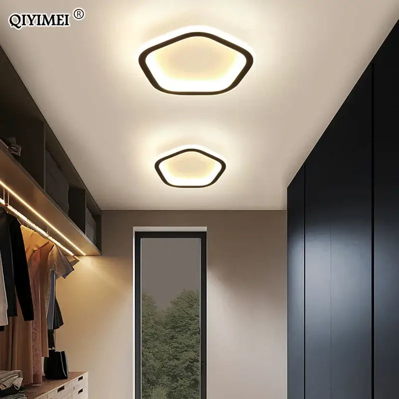 Modern hexagonal decorbites black led ceiling light with sleek black frame and warm white led illumination for indoor use