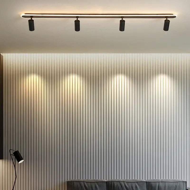 Modern decorbites black led ceiling spotlights with four adjustable black LED spotlights on a minimalist ceiling bar