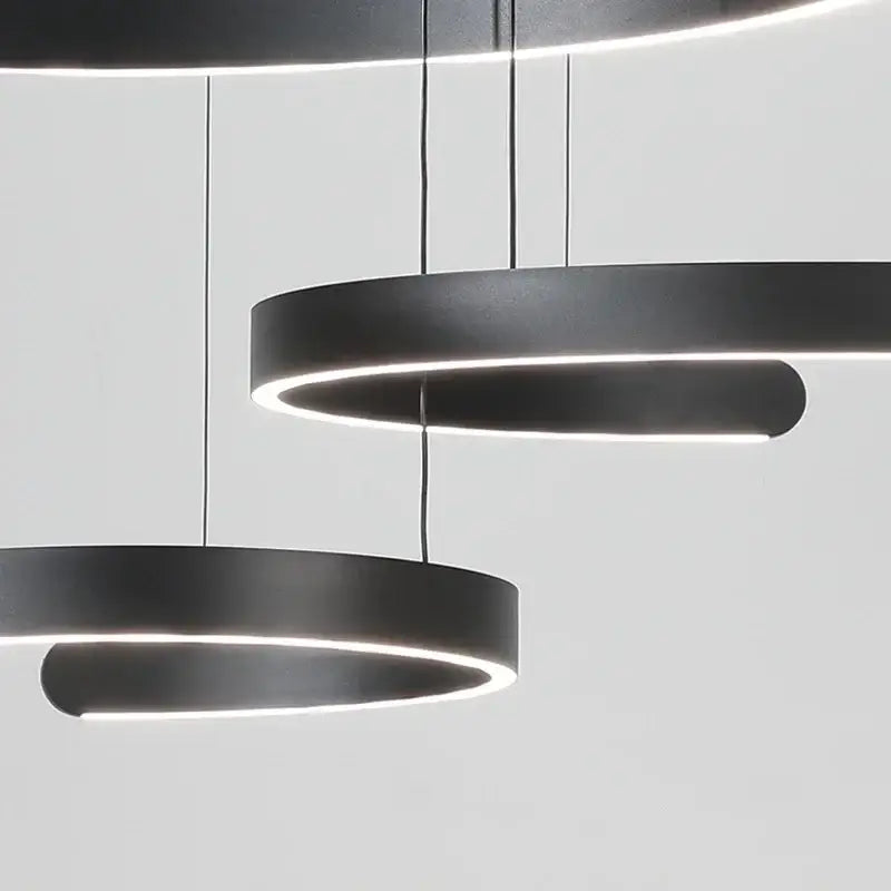 Modern black led chandelier pendant light by decorbites with sleek circular design for foyer stairs and bar lighting