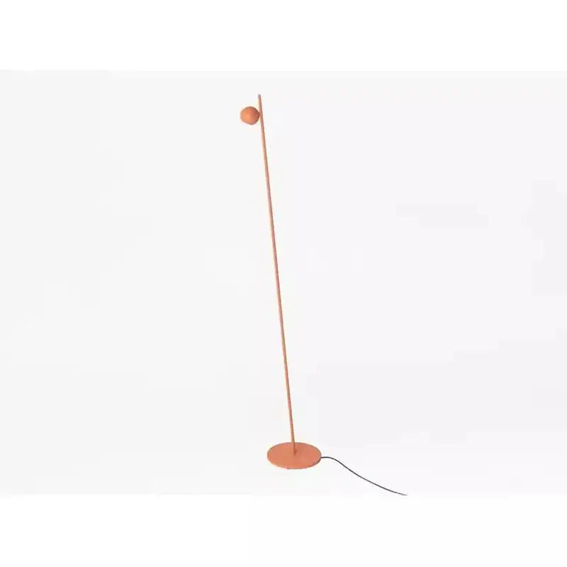 Terracotta-colored floor lamp with slender pole circular base and spherical light fixture by decorbites black led floor lamp