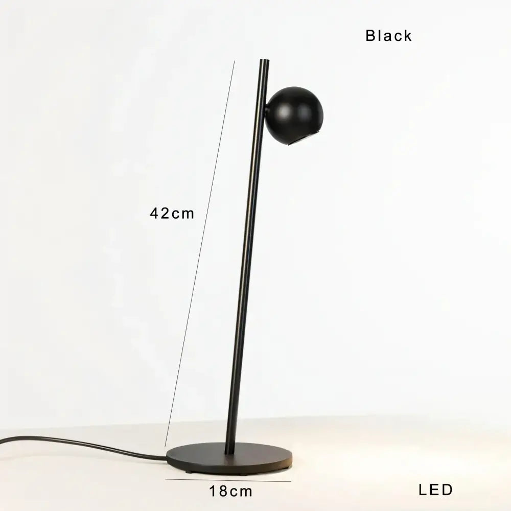 DecorBites black led floor lamp with sleek cylindrical stem and spherical head in minimalist Nordic design