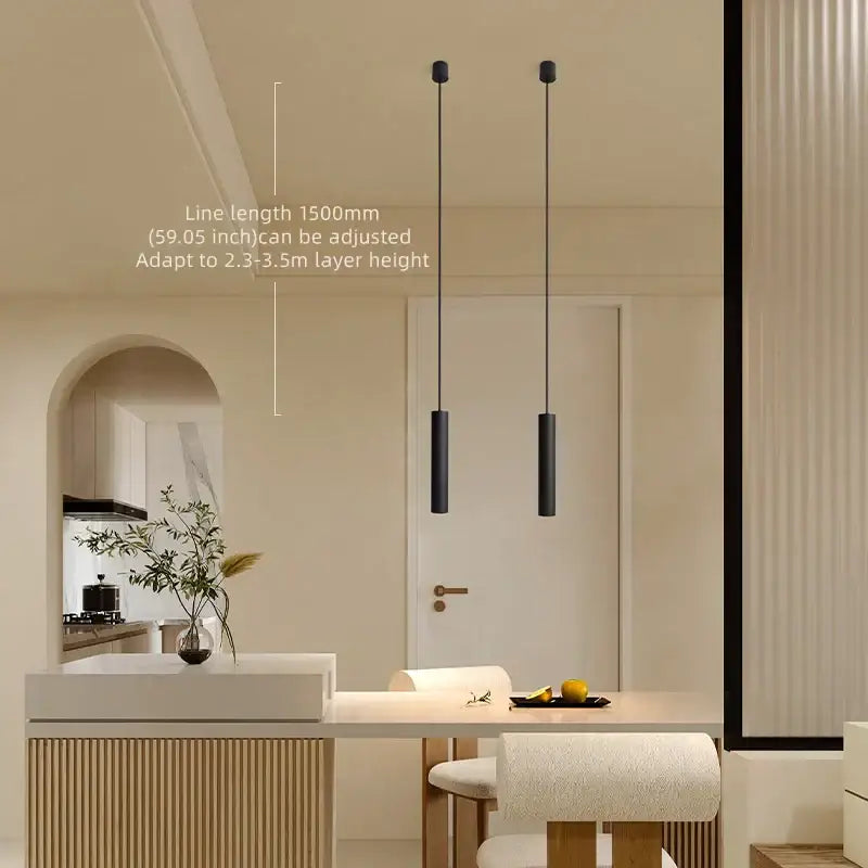 Two sleek black led pendant lights hang by thin cords featuring decorbites black led anti-glare spot design