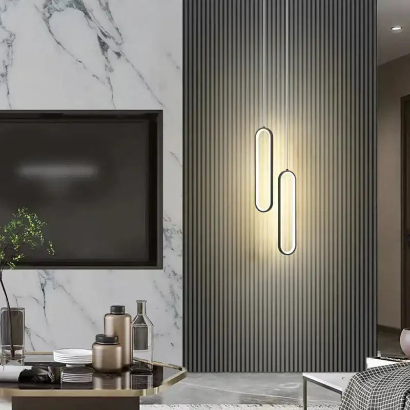 Modern minimalist decorbites black led pendant light with sleek oval shapes and warm led illumination for bedrooms