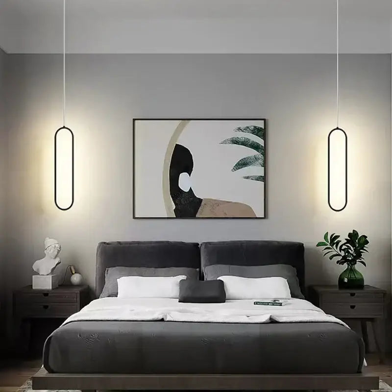 Modern oval pendant light with sleek black frame and warm glow from decorbites black led pendant lamp for bedrooms