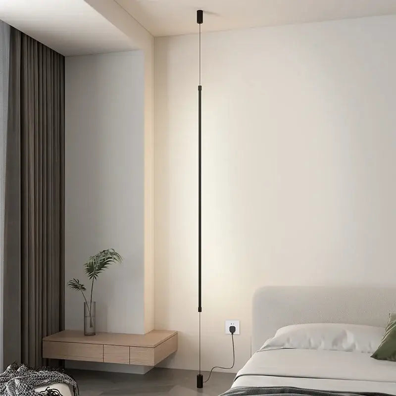 Minimalist DecorBites black LED pendant light with sleek vertical design for modern living room and bedroom decor