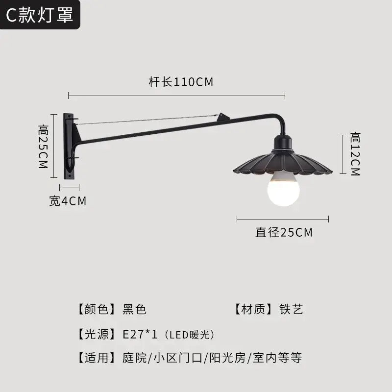 Decorbites black led swing arm wall lamp featuring a black wrought iron c style design with fluted petal shade and e27 led bulb
