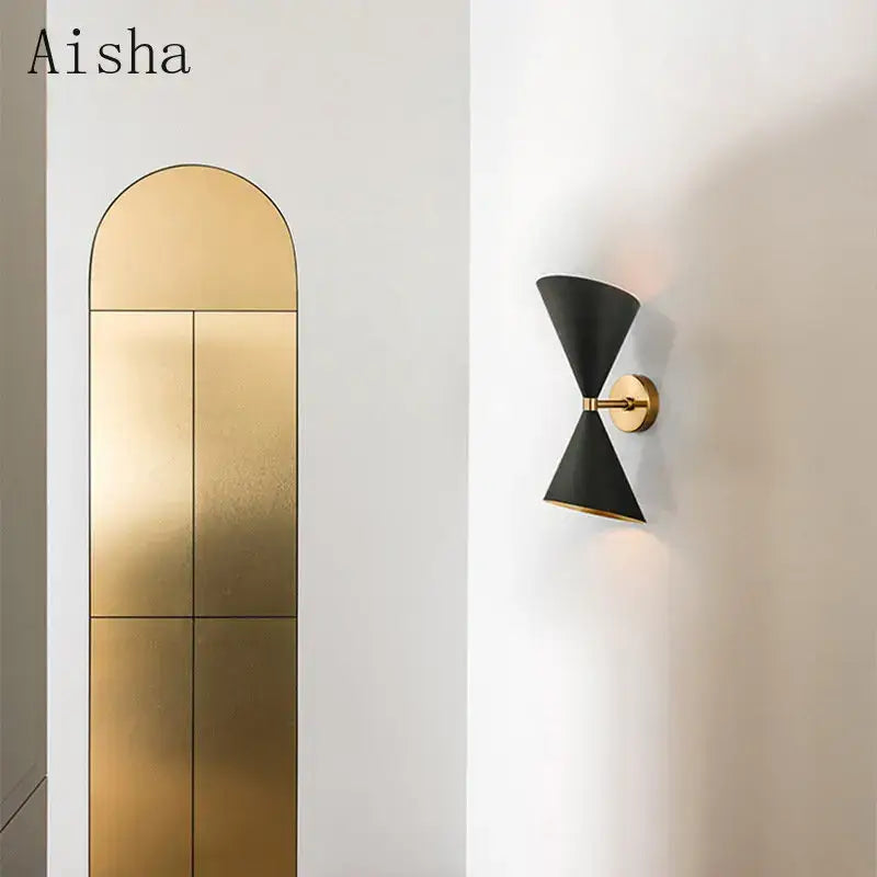 Black conical wall lamp with gold-toned central arm by DecorBites black led for modern home lighting