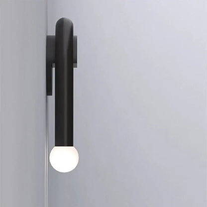 Decorbites black led wall lamp with matte black cylindrical body and frosted glass bulb for modern indoor use