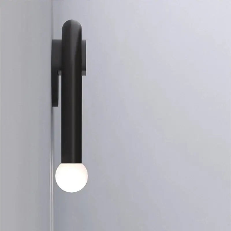 Decorbites black led wall lamp with matte black cylindrical body and frosted glass bulb for modern indoor use