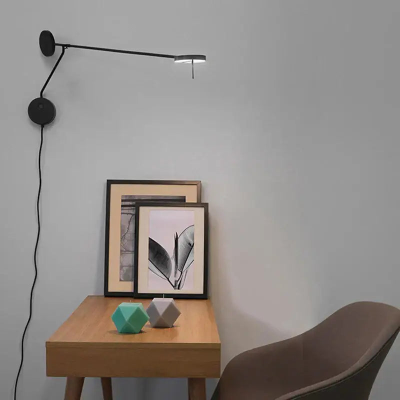 Black wall-mounted adjustable decorbites black led reading light with sleek modern design for bedroom and office use