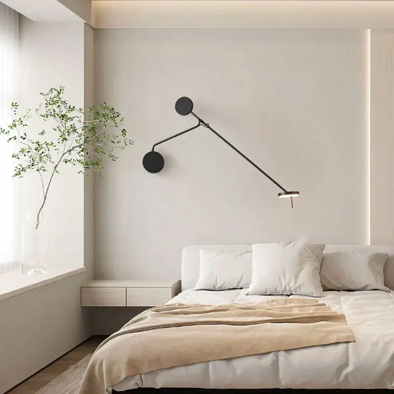Modern black decorbites black led wall reading light with sleek angular arms and circular fixtures for bedroom office use