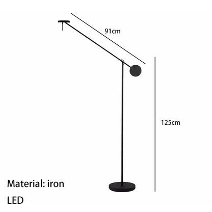Black iron floor lamp with adjustable arm and spherical light head in decorbites black led wall reading light design