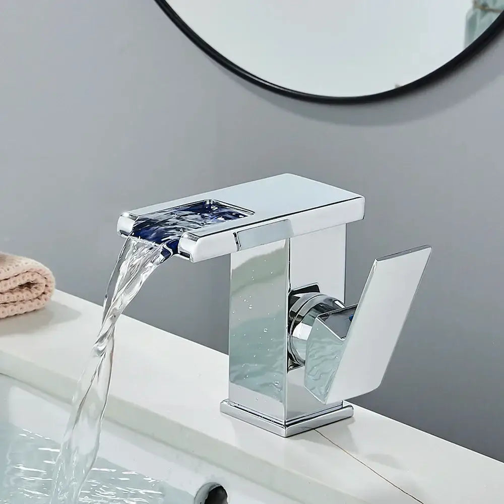 Chrome-finished waterfall faucet with sleek design and blue glass accent from decorbites black led waterfall bath