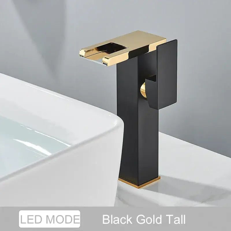 DecorBites black LED waterfall bathroom faucet in black and gold with modern rectangular deck mounted design and three color change