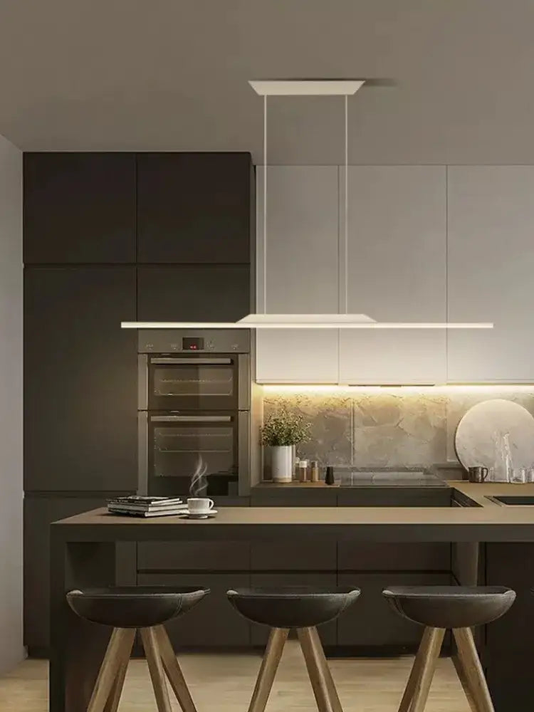 Modern minimalist DecorBites black line chandelier with sleek white rectangular pendant and thin cables for elegant salon design