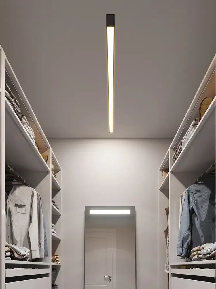 A sleek DecorBites black linear LED ceiling lamp with warm white light for living room aisle and dining room use