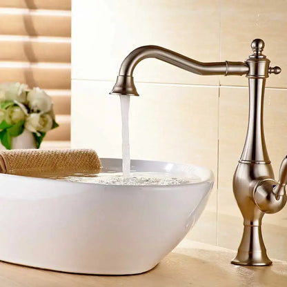 Antique brass-finished single-handle kitchen faucet with curved spout and ornate detailing from decorbites black long neck series