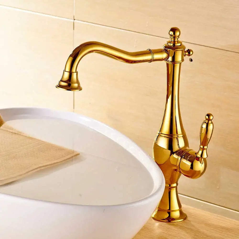 Golden brass-finished vintage-style long neck kitchen faucet with ornate detailing and curved spout by decorbites black long neck