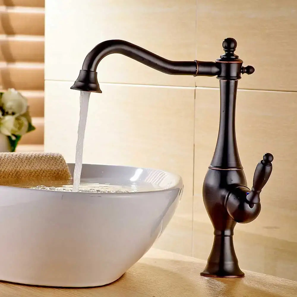 Antique bronze-finished decorbites black long neck kitchen faucet with single handle and curved spout ornate detailing