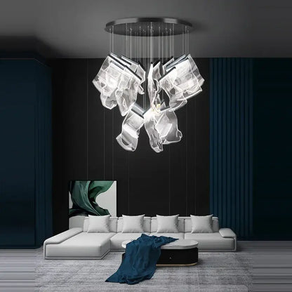 Modern decorbites black love chandelier lighting with sleek circular metal base and cascading glass for dining room