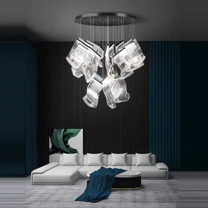 Modern decorbites black love chandelier lighting with sleek circular metal base and cascading glass for dining room
