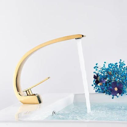 DecorBites luxury brass basin faucet mixer tap in gold-toned sleek curved design for modern basin faucet use