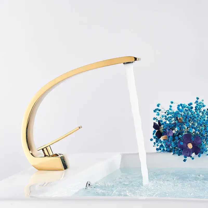DecorBites luxury brass basin faucet mixer tap in gold-toned sleek curved design for modern basin faucet use