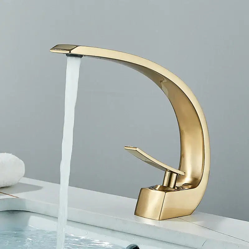 Decorbites™ black luxury brass basin faucet mixer tap with gold-toned modern curved design and single lever handle
