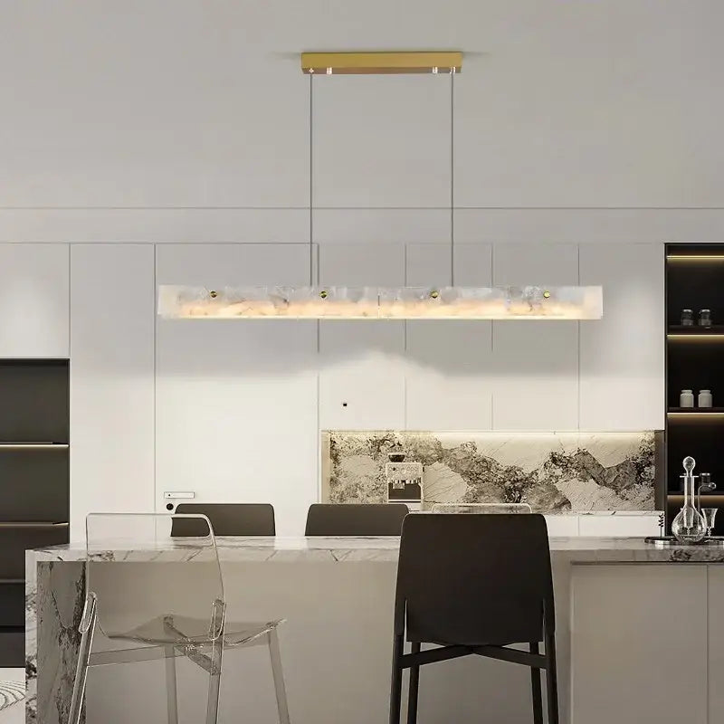 A decorbites black marble pendant chandelier with a sleek gold frame and illuminated marble pendant center for modern decor