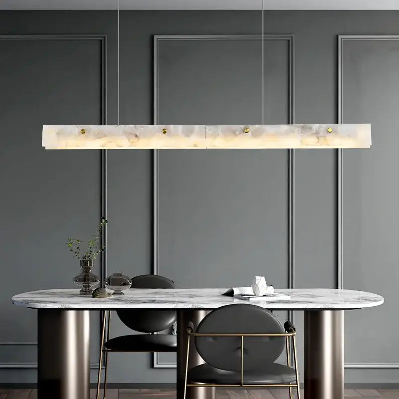 Decorbites black marble pendant chandelier with sleek rectangular white marble finish and gold-toned hardware for modern decor