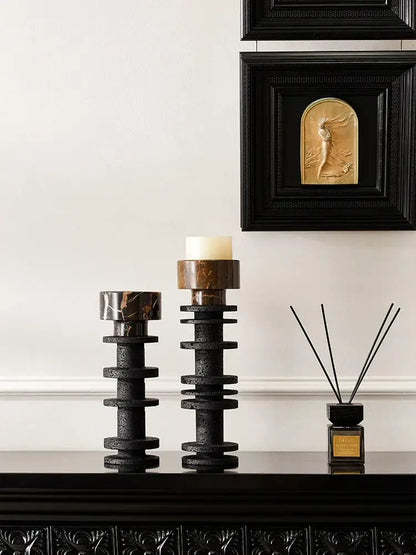 Decorbites black marble pillar candlestick with stacked tiered design and gold toned tops for elegant table centerpieces