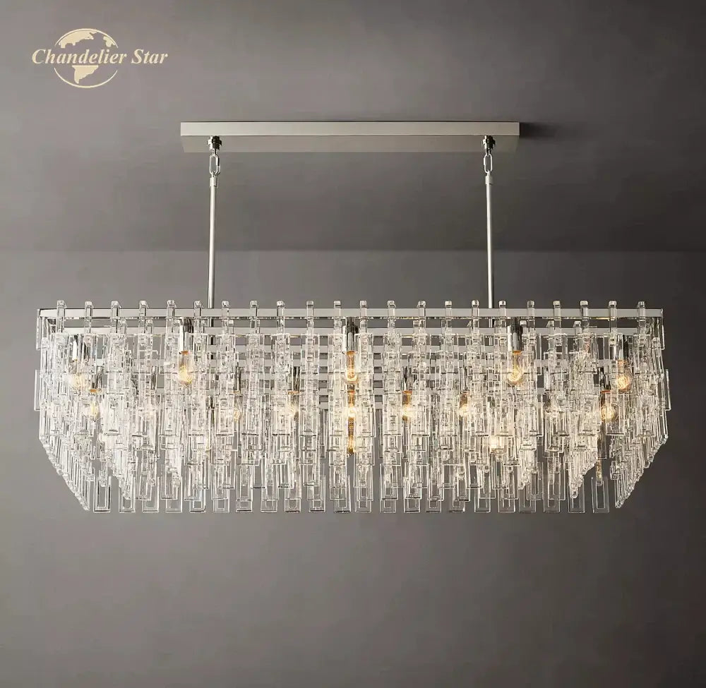 A modern decorbites black marignan rectangular chandelier with silver frame clear crystal prisms and warm exposed bulbs