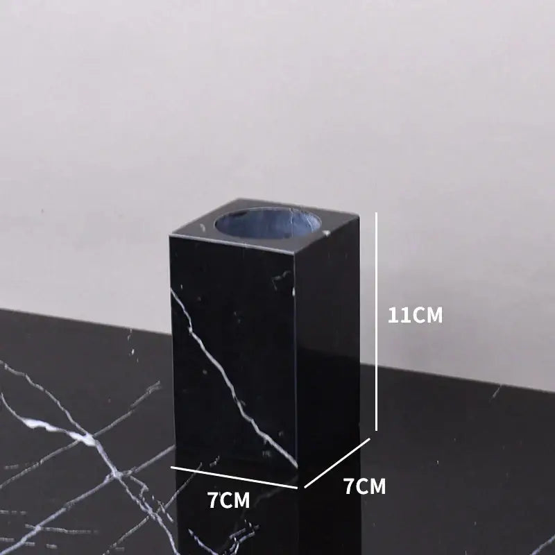 Black marquina cylindrical marble vase with glossy finish and white veining for decorbites black marquina bathroom set