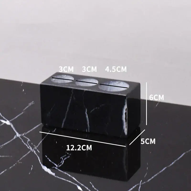 DecorBites black marquina bathroom set featuring a black marble three-compartment vase with polished surface and white veining
