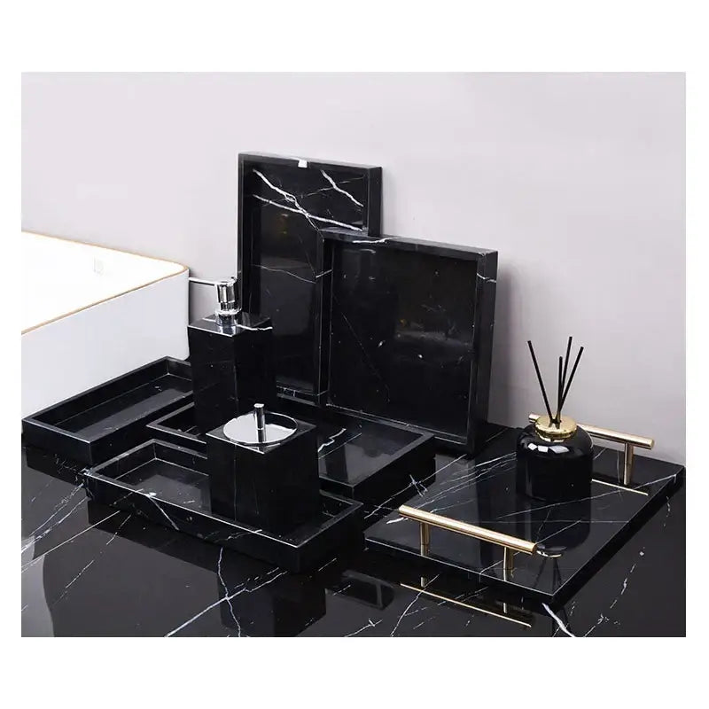 Decorbites black marquina bathroom set featuring black marble tray with gold-tone handles and matching accessories