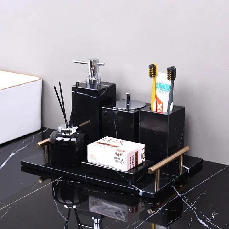 Black marquina bathroom set by decorbites featuring black marble tray with gold handles and matching holder dispenser diffuser