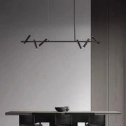 Decorbites black metal chandelier featuring sleek angular arms with integrated led bulbs for minimalist dining rooms