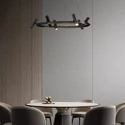 Decorbites black metal chandelier with black circular pendant and angular branch-like arms for minimalist dining room lighting