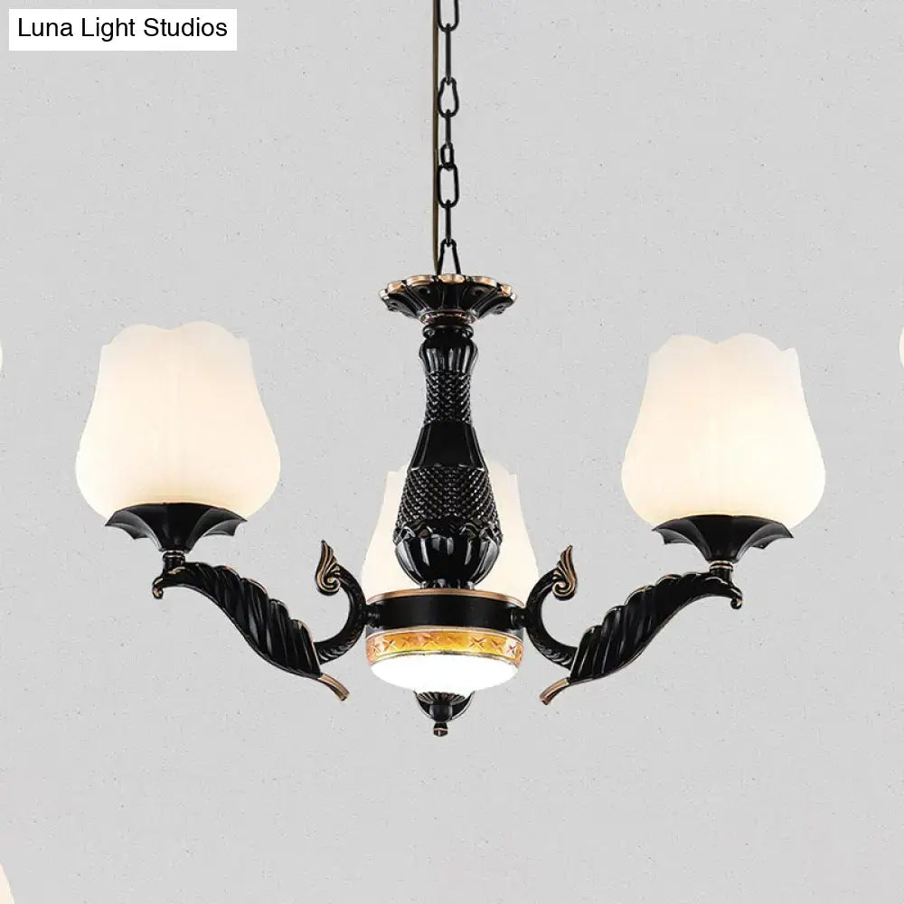 Elegant black metal chandelier with frosted glass tulip-shaped shades and gold accents from decorbites