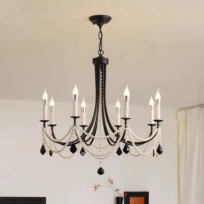 Decorbites black metal led candle chandelier with black wrought iron, white pearls, and black crystal teardrops for dining room