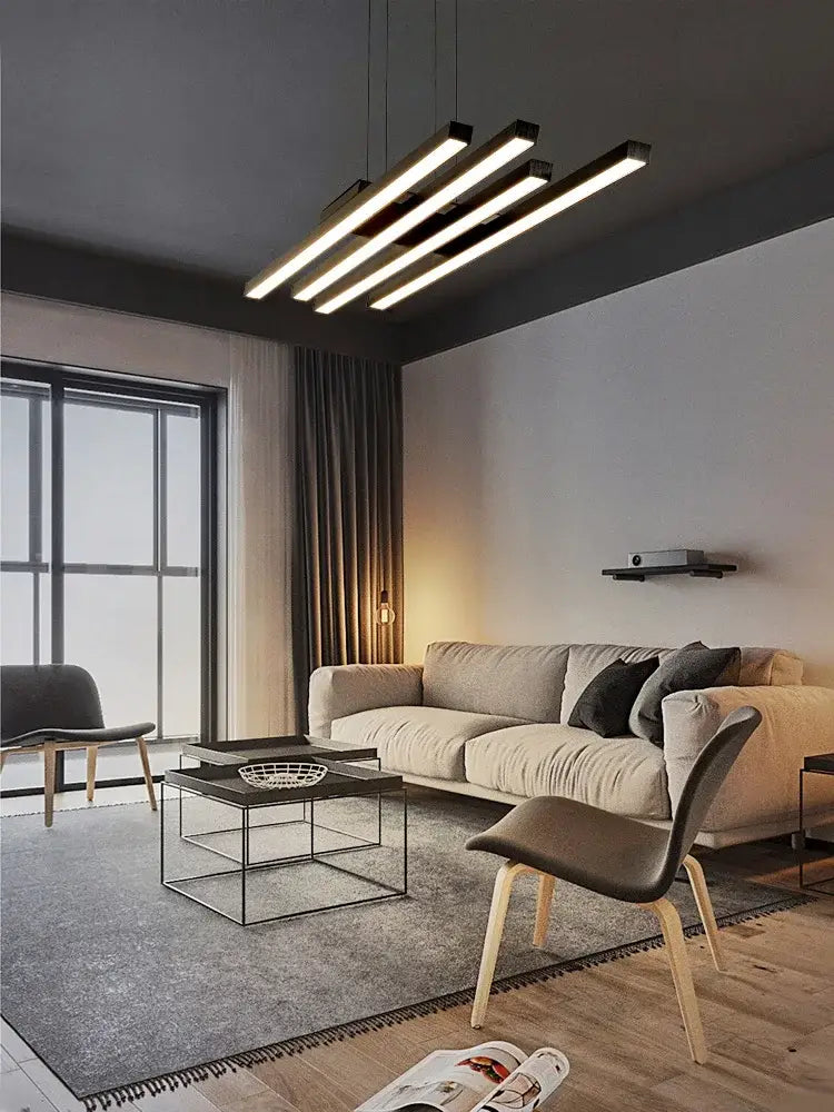 Modern minimalist pendant light featuring four sleek rectangular led bars in matte black finish for living room use by decorbites black nordic chandelier