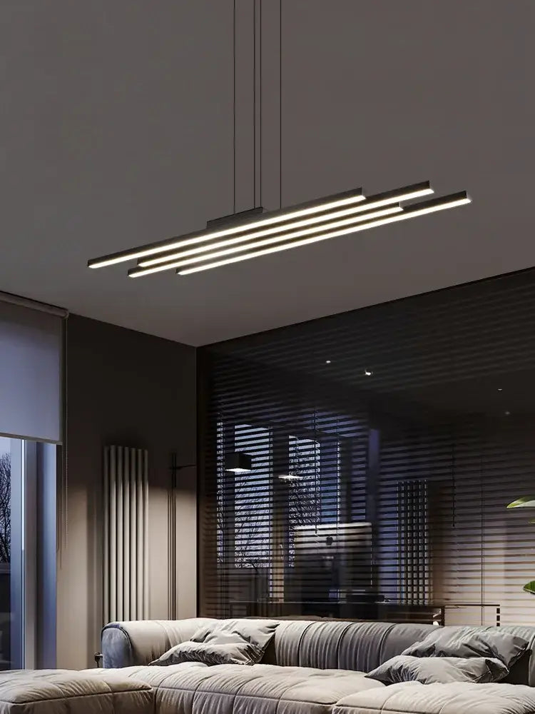 Decorbites black nordic chandelier featuring a minimalist design with three sleek metallic bars emitting warm light