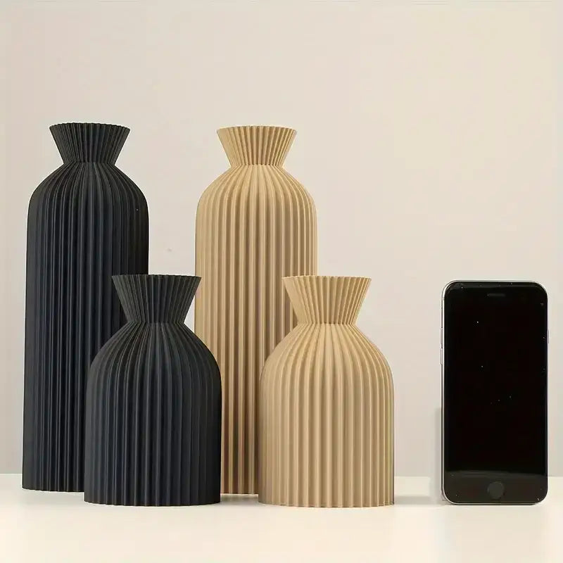 Set of four decorbites™ black plastic vases in black and beige with a sleek ribbed pleated design and flared necks
