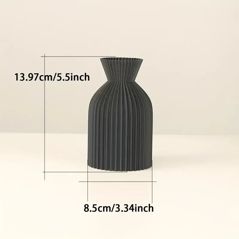 DecorBites™ black plastic vase with a sleek dark gray pleated fluted design for stylish boho decor centerpiece