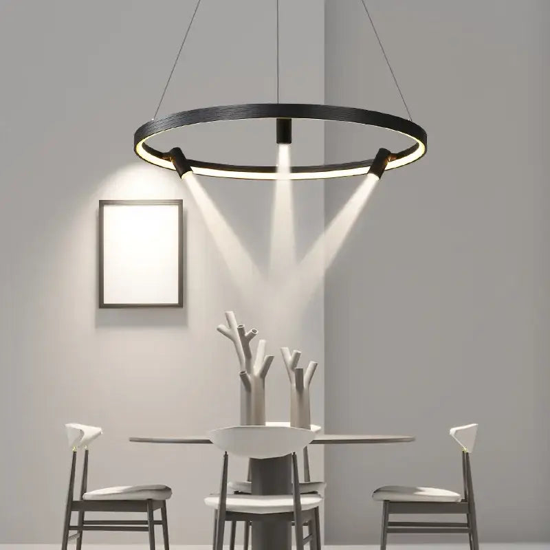 Modern decorbites black round combo chandelier with integrated led and three downward-facing spotlights for living room use