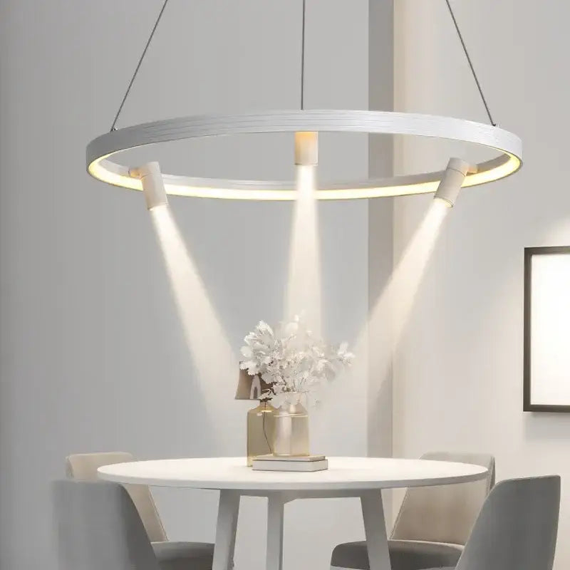 Modern white circular pendant light with three adjustable spotlight arms in decorbites black round combo chandelier style