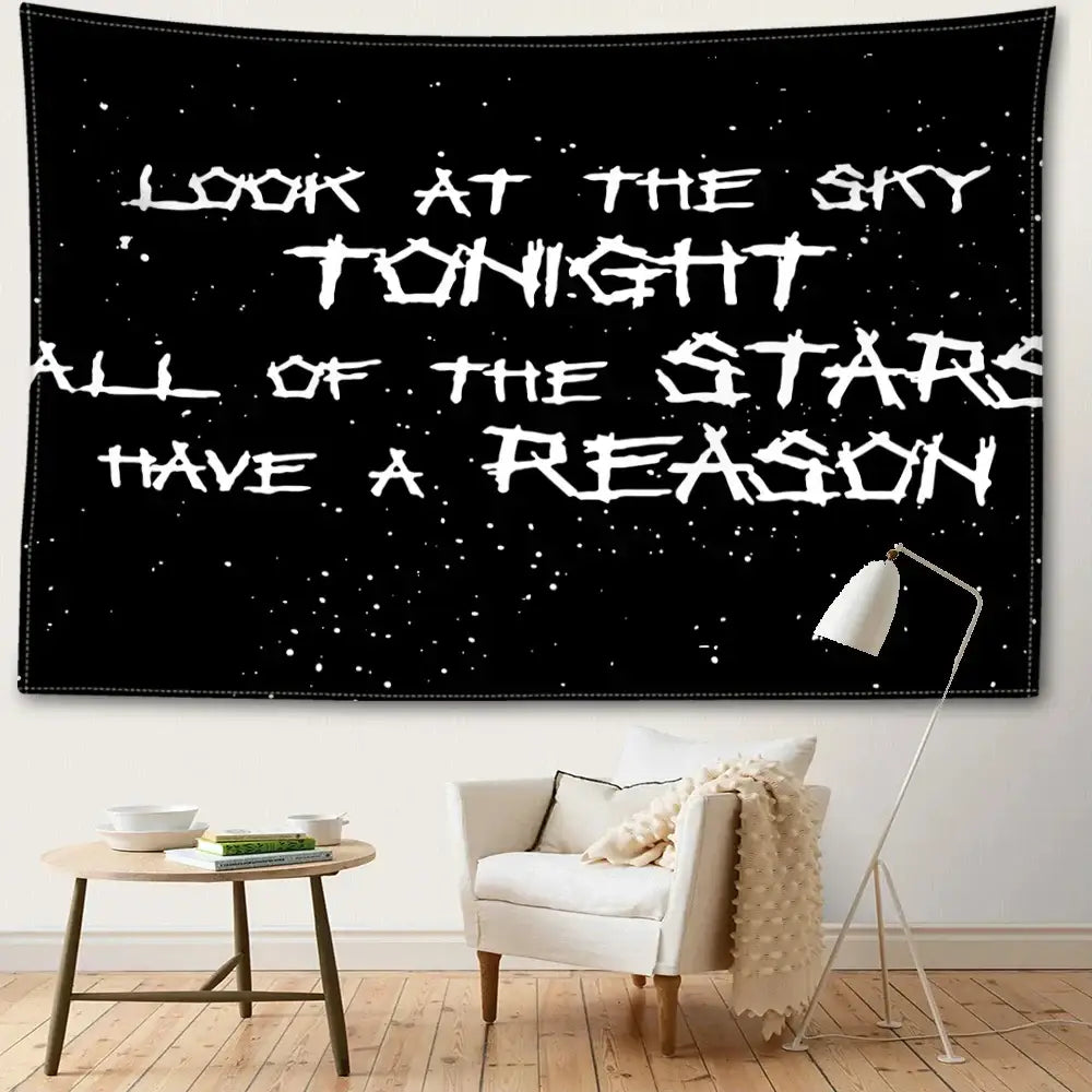Decorbites black sky art tapestry features a black starry night with white distressed lettering for bedroom decor