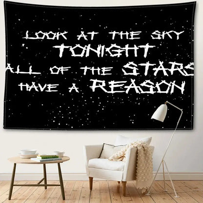 Decorbites black sky art tapestry features a black starry night with white distressed lettering for bedroom decor