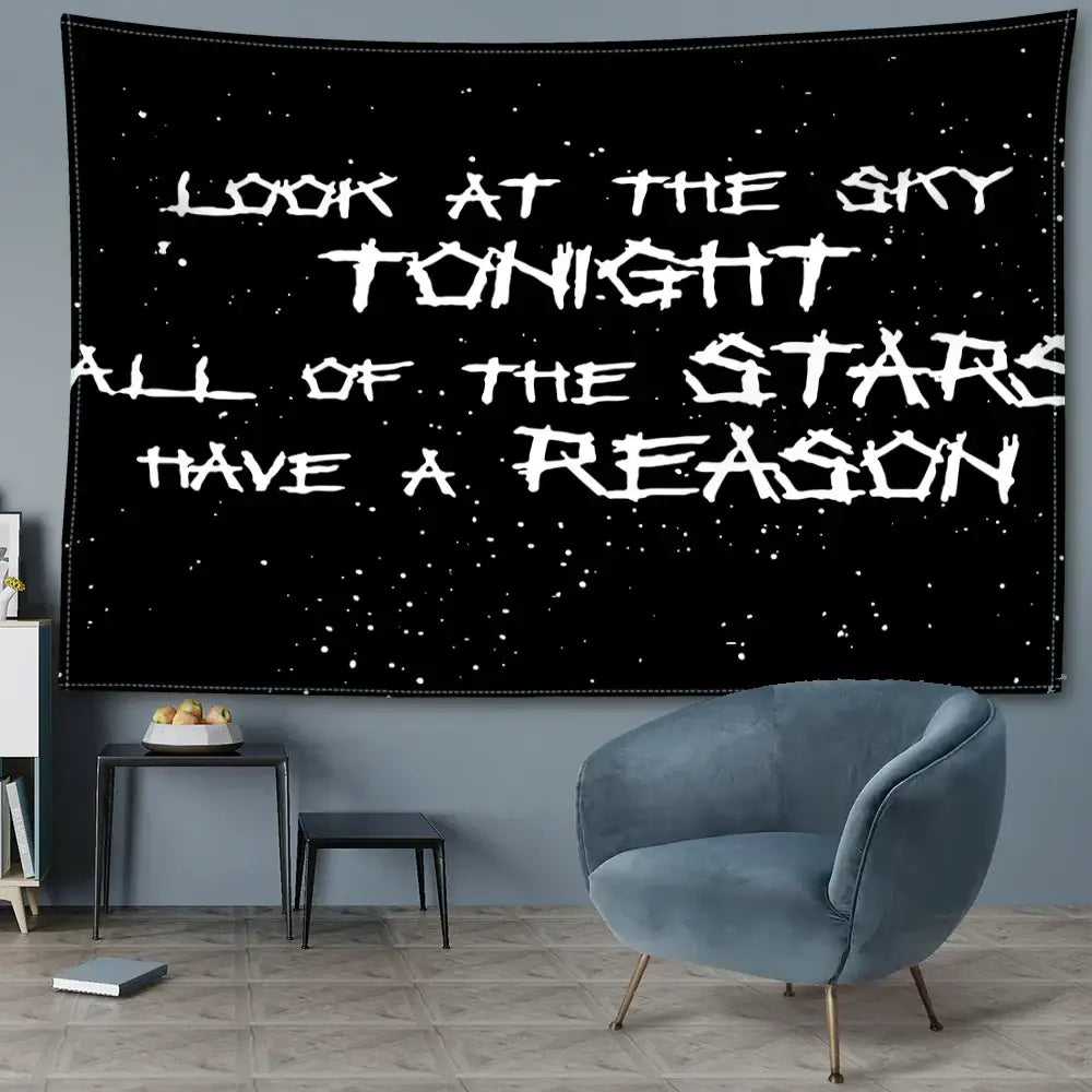 Decorbites black sky art tapestry featuring white distressed lettering on black starry fabric for bedroom wall decor